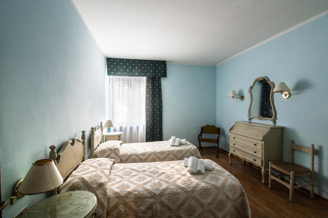 Royal Hotel Paolino Cavareno Habitación foto
